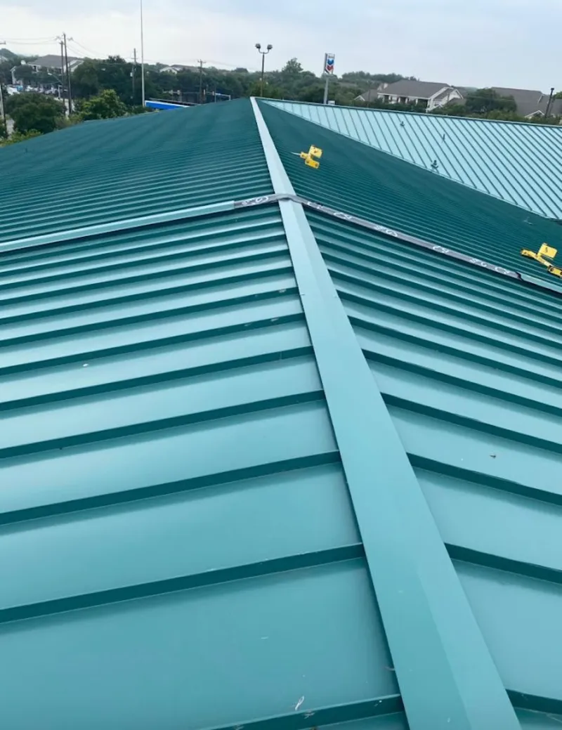 Green commercial metal roof ridge and valley for Metal Roof Repair in McKinleyville